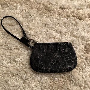 Coach small wristlet- never used. Black
